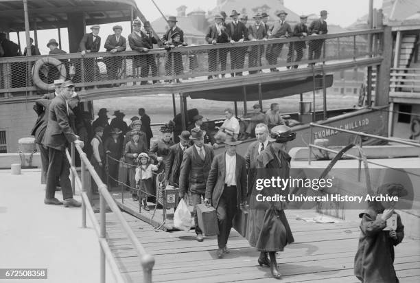 Arrival of Immigrants, Ellis Island, New York City, New York, USA, Bain News Service, 1920.