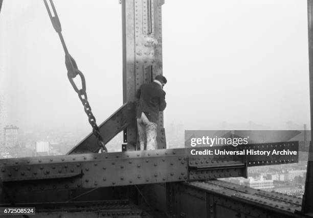 Construction Worker Working on 33rd Floor of Metropolitan Life Insurance Company Tower, New York City, New York, USA, Bain News Service, January 1908.