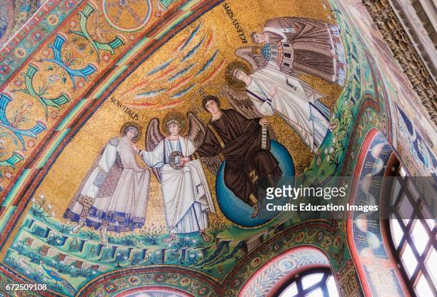 Ravenna, Ravenna Province, Italy, Mosaic in apse of San Vitale of Christ flanked by two angels and St Vitalis and Bishop Ecclesius, Christ is handing...