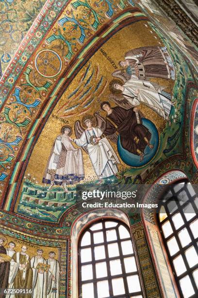 Ravenna, Ravenna Province, Italy, Mosaic in apse of San Vitale of Christ flanked by two angels and St Vitalis and Bishop Ecclesius, Christ is handing...
