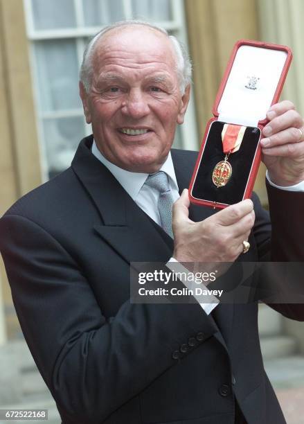 Boxer Sir Henry Cooper after receiving a knighthood from the Queen at Buckingham Palace, London, 22nd Fenruary 2000.