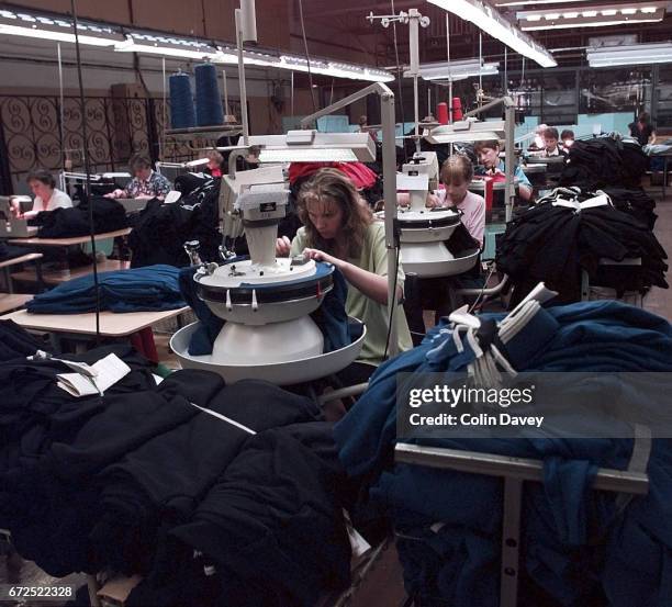 General view of women making garments at Ogres Knitwear textile factory near Riga, Latvia, 28th September 1999. The line was working on garments for...