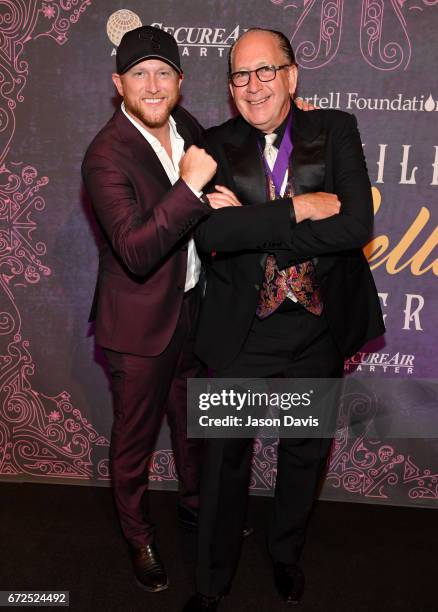 Singer-songwriter Cole Swindell and Committee Co-Chair John Esposito attend Best Cellars Wine Dinner hosted by T.J. Martell Foundation on April 24,...