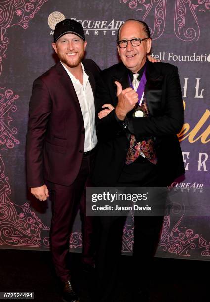 Singer-songwriter Cole Swindell and Committee Co-Chair John Esposito attend Best Cellars Wine Dinner hosted by T.J. Martell Foundation on April 24,...