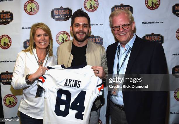 Stacy Brown - Co-Founder of Chicken Salad Chick Foundation, Thomas Rhett and Stuart Dill - Co-Creator of Music and Miracles Superfest attend Music...