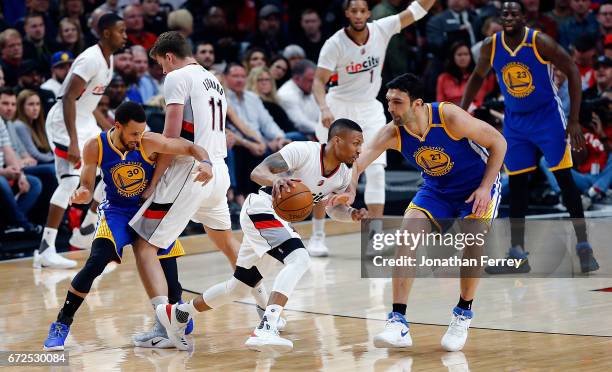 Damian Lillard of the Portland Trail Blazers drives against the Golden State Warriors during Game Four of the Western Conference Quarterfinals of the...