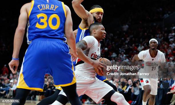 Damian Lillard of the Portland Trail Blazers drives against the Golden State Warriors during Game Four of the Western Conference Quarterfinals of the...