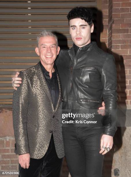 Radio personality Elvis Duran and Leon Else attend the George Michael Tribute Concert presented by VH1's Save The Music at Highline Ballroom on April...