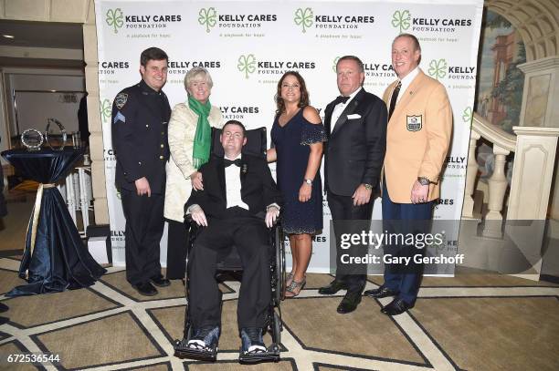 Police Officer Conor MacDonald, Patti MacDonald, honoree Patrick Quinn, The Kelly Cares Foundation co-founders Paqui Kelly and Brian Kelly,and...