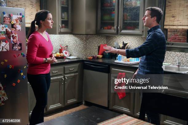 Moo Moo" Episode 418 -- Pictured: Melissa Fumero as Amy Santiago, Andy Samberg as Jake Peralta --