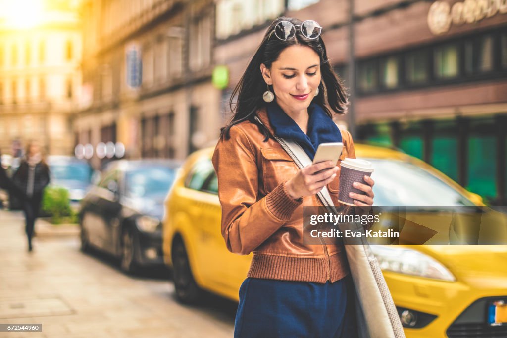 Beautiful woman spending time in the city