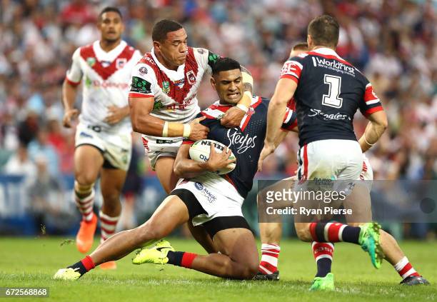Tyson Frizell of the Dragons tackles Daniel Tupou of the Roosters during the round eight NRL match between the Sydney Roosters and the St George...