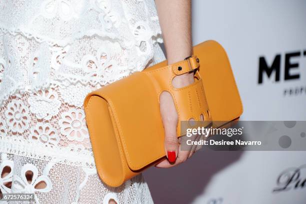 Carolina Gonzalez, clutch detail, attend BELLA New York Spring Issue Cover Party hosted by Kelly Osbourne at Bagatelle on April 24, 2017 in New York...