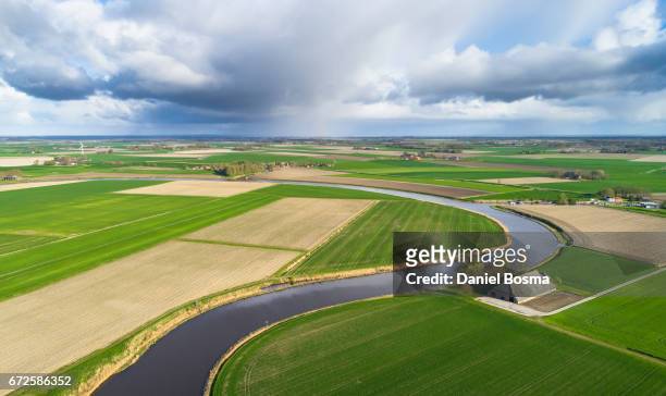 historical and protected landscape in the netherlands seen from above - woongebouw fotografías e imágenes de stock