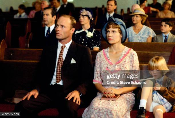 Ed Harris and Lindsay Crouse sit together in a scene from the film 'Places in the Heart' , 1983.