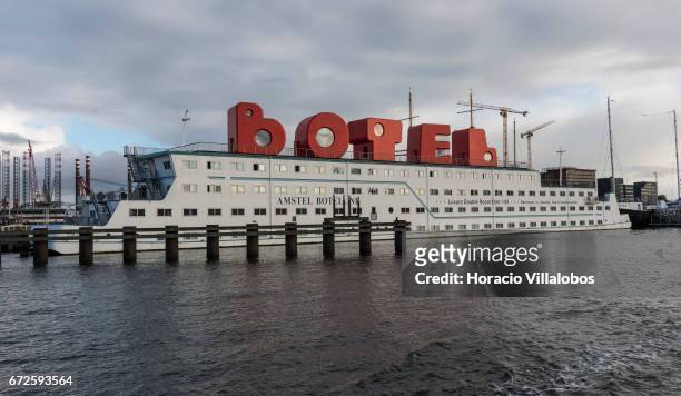 View of the Amstel Botel from the ferry sailing between NDSM Pier and Central Station on April 23, 2017 in Amsterdam, Netherlands. Amstel Botel is a...