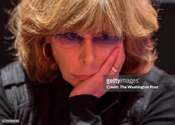 Jane Hitchcock author and writer from Georgetown, studies her opponents while playing in a poker tournament at Maryland Live Casino on April 14, 2017...