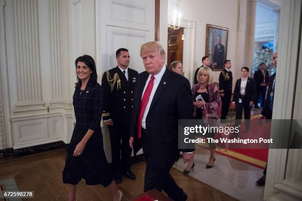 President Donald Trump and U.S. Ambassador to the UN Nikki Haley arrive for a working lunch with ambassadors of countries on the United Nations...