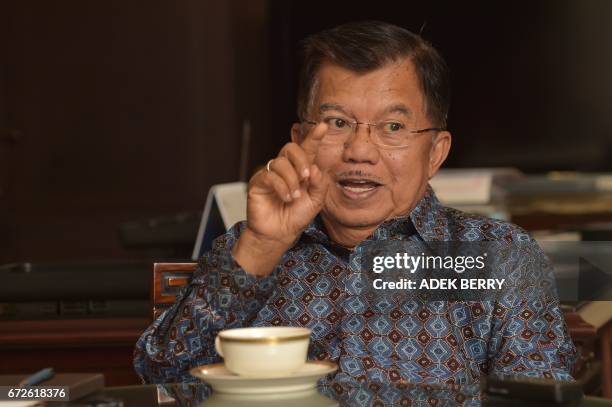 Indonesian Vice President Jusuf Kalla speaks during an interview with AFP at his office in Jakarta on April 25, 2017. Indonesia's vice president on...