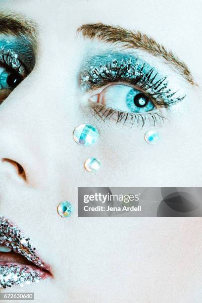 metallic eye makeup close up - eyes crying stock-fotos und bilder