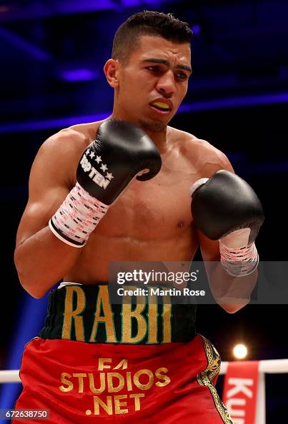 Mohamed Rabi Mohammed Rabii of Morocco in action against Jean Pierre Habimana of ...