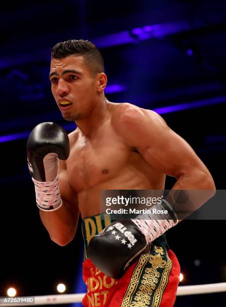 Mohammed Rabii of Morocco in action against Jean Pierre Habimana of Belgium during their super welterweight fight at Messehalle Erfurt on April 22,...