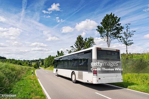 commuter bus - getting on bus stockfoto's en -beelden
