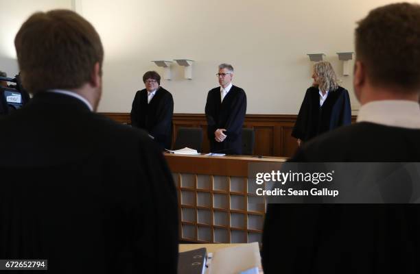 Judges and lawyers arrive for the first day of a legal appeal by a woman against Facebook at the Kammergericht courthouse on April 25, 2017 in...