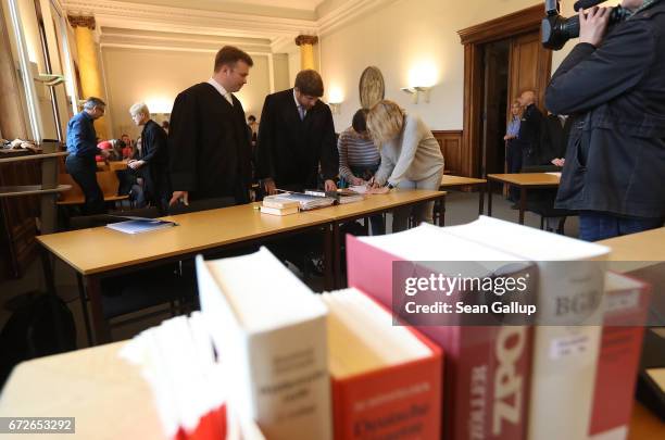 Lawyers arrive for the first day of a legal appeal by a woman against Facebook at the Kammergericht courthouse on April 25, 2017 in Berlin, Germany....