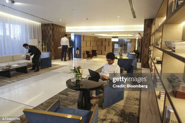 Employees work inside the reception area of Lodha Altamount, a luxury residential project developed by Lodha Developers Ltd., in Mumbai, India, on...