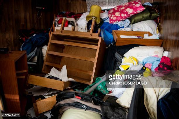 General view of a flat following a raid by members of the Catalan Regional Police in Barcelona on April 25, 2017 that led to the arrest of four men...