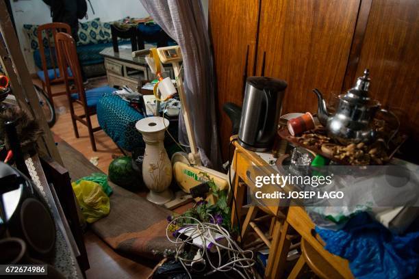 General view of a flat following a raid by members of the Catalan Regional Police in Barcelona on April 25, 2017 that led to the arrest of four men...