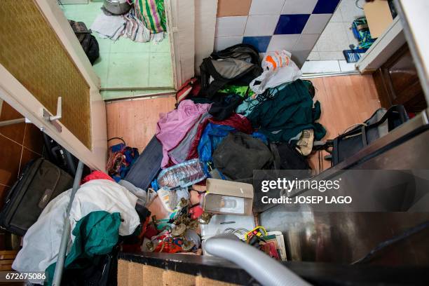 General view of a flat following a raid by members of the Catalan Regional Police in Barcelona on April 25, 2017 that led to the arrest of four men...