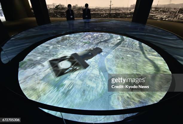 Hiroshima Peace Memorial Museum unveils a computer graphics-based image of the 1945 atomic bombing of Hiroshima to the media in the western Japanese...
