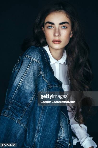 denim girl - blue jacket stock pictures, royalty-free photos & images