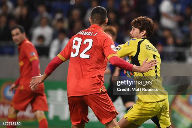 Hideaki Higashiguchi of Gamba Osaka pushes Eli Babalj of Adelaide United during the AFC Champions League Group H match between Gamba Osaka v Adelaide...