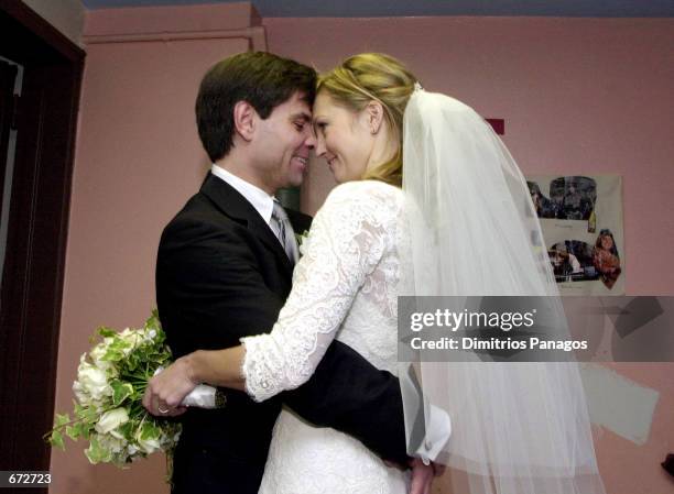 Former presidential advisor George Stephanopoulos looks at his new bride Alexandra Wentworth November 20, 2001 at the Holy Trinity Cathedral Greek...