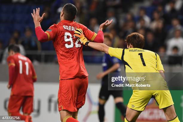 Hideaki Higashiguchi of Gamba Osaka pushes Eli Babalj of Adelaide United during the AFC Champions League Group H match between Gamba Osaka v Adelaide...