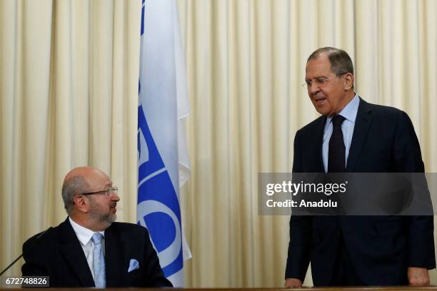 Russian Foreign Minister Sergei Lavrov and OSCE Secretary-General Lamberto Zannier attend a joint press conference after their meeting at the guest...