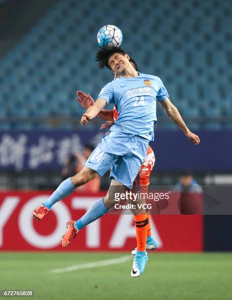 Ji Xiang of Jiangsu Suning heads the ball during 2017 AFC Champions League group match between Jiangsu Suning F.C. And Jeju United F.C. At Nanjing...