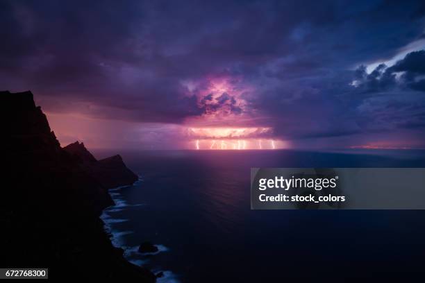 night view in the storm - thunderstorm ocean blue stock pictures, royalty-free photos & images