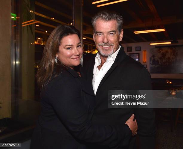 Keely Shaye Smith and Pierce Brosnan attend Barbra Streisand's 75th birthday at Cafe Habana on April 24, 2017 in Malibu, California.