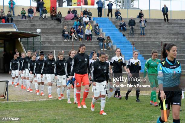 Germany women's U16 and Belgium women's U16 players enter on the pitch before the 2nd Female Tournament 'Delle Nazioni' match between Germany U16 and...