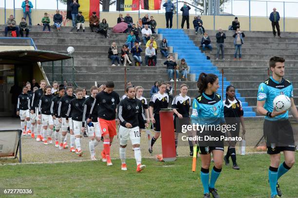 Germany women's U16 and Belgium women's U16 players enter on the pitch before the 2nd Female Tournament 'Delle Nazioni' match between Germany U16 and...