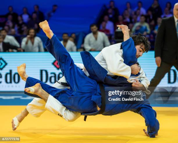 Rufat Ismayilov of Azerbaijan throws Sergii Krivchach of Ukraine for a wazari but eventually lost the u81kg contest by ippon after being disqualified...