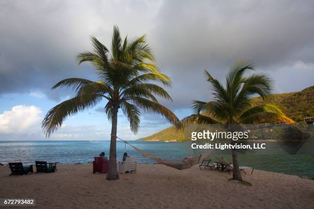 saba rock beach in british virgin island - saba stock pictures, royalty-free photos & images