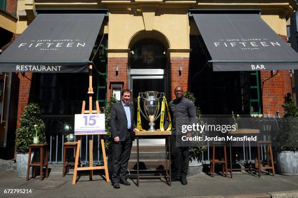 Ugo Monye and Mark McCafferty pose for a photo with the Premiership Trophy during the Media Lunch to celebrate the 15th Premiership Rugby Final With...