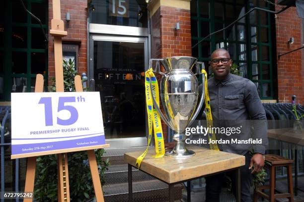 Ugo Monye poses with the Premiership Trophy during the Media Lunch to celebrate the 15th Premiership Rugby Final With Ugo Monye And Mark McCafferty...