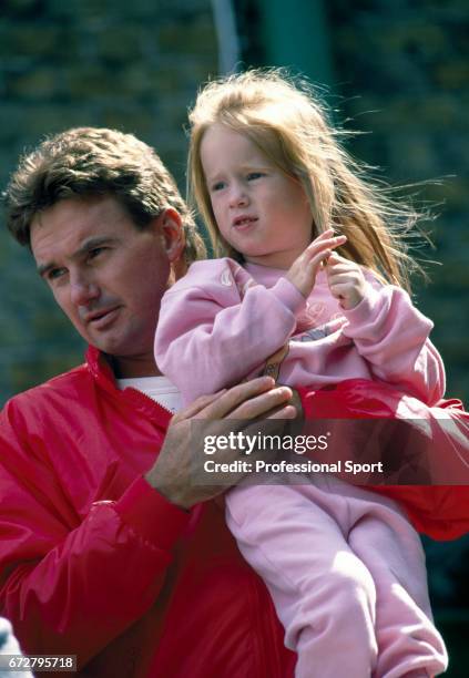 Jimmy Connors of the USA with his daughter Aubree at the Queen's Club in London, circa June 1988.