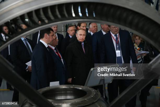 Russian President Vladimir Putin observes the NPO Saturn plant in Rybinsk, Russia, April 2017. Putin is having a one-day trip to Rybinsk to visit the...